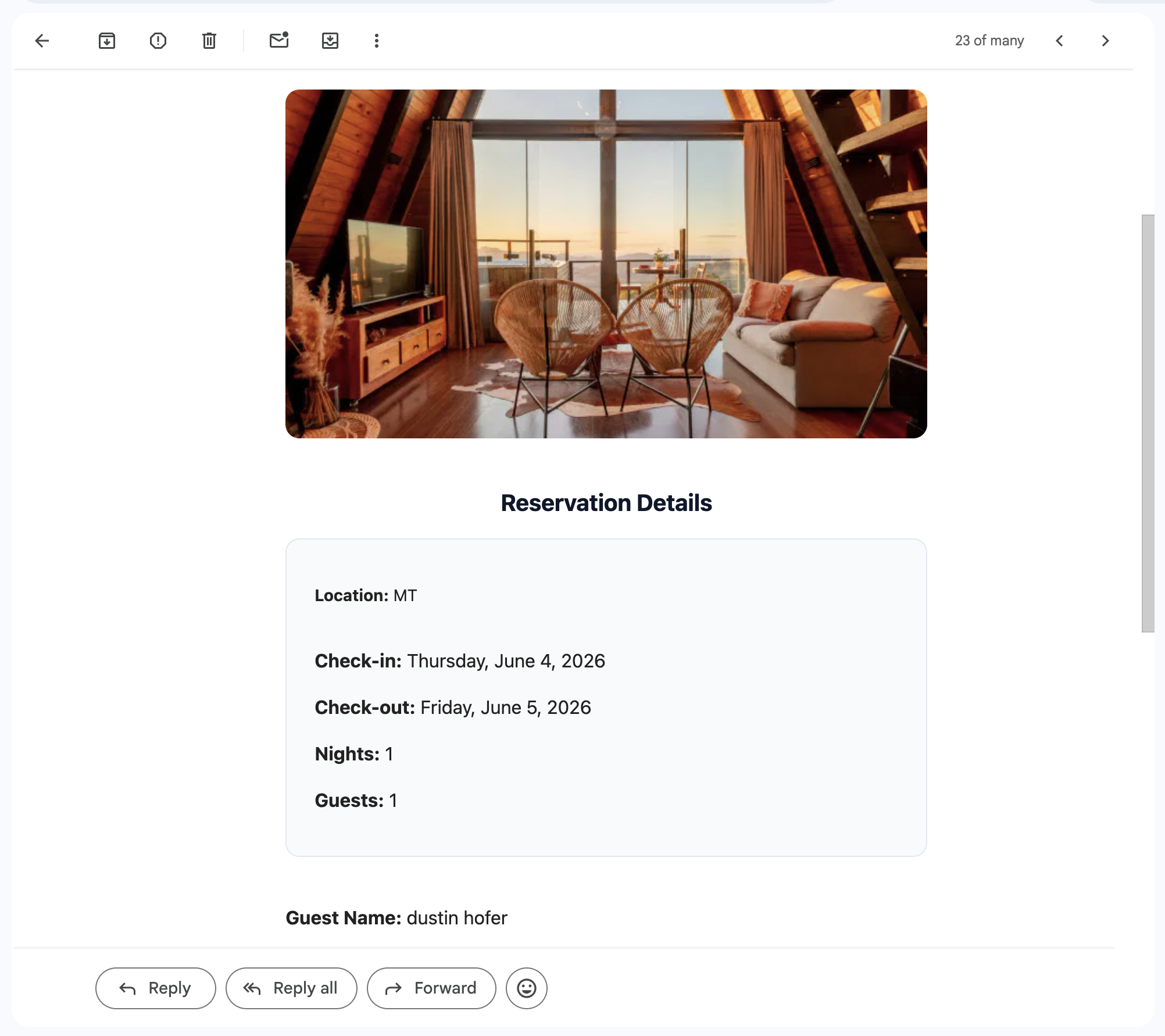 Example guest booking confirmation email showing the property, dates, and total
